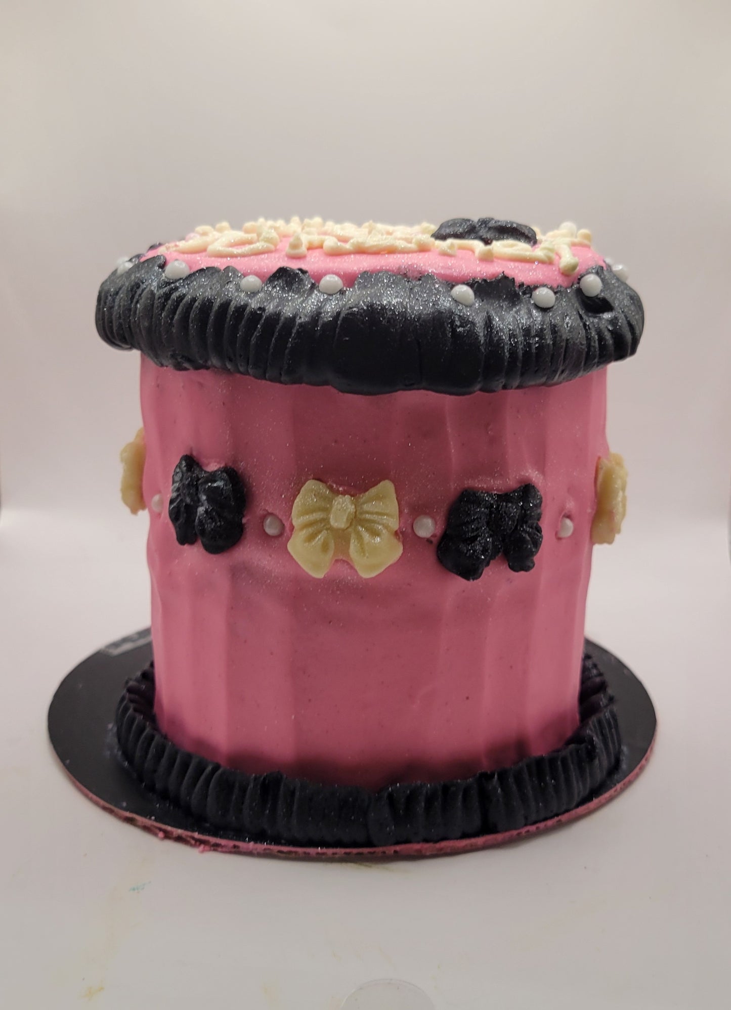 4 inch round double layer Upper tier  ( The Chanel Cake)
